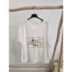 Camiseta blanca flores...